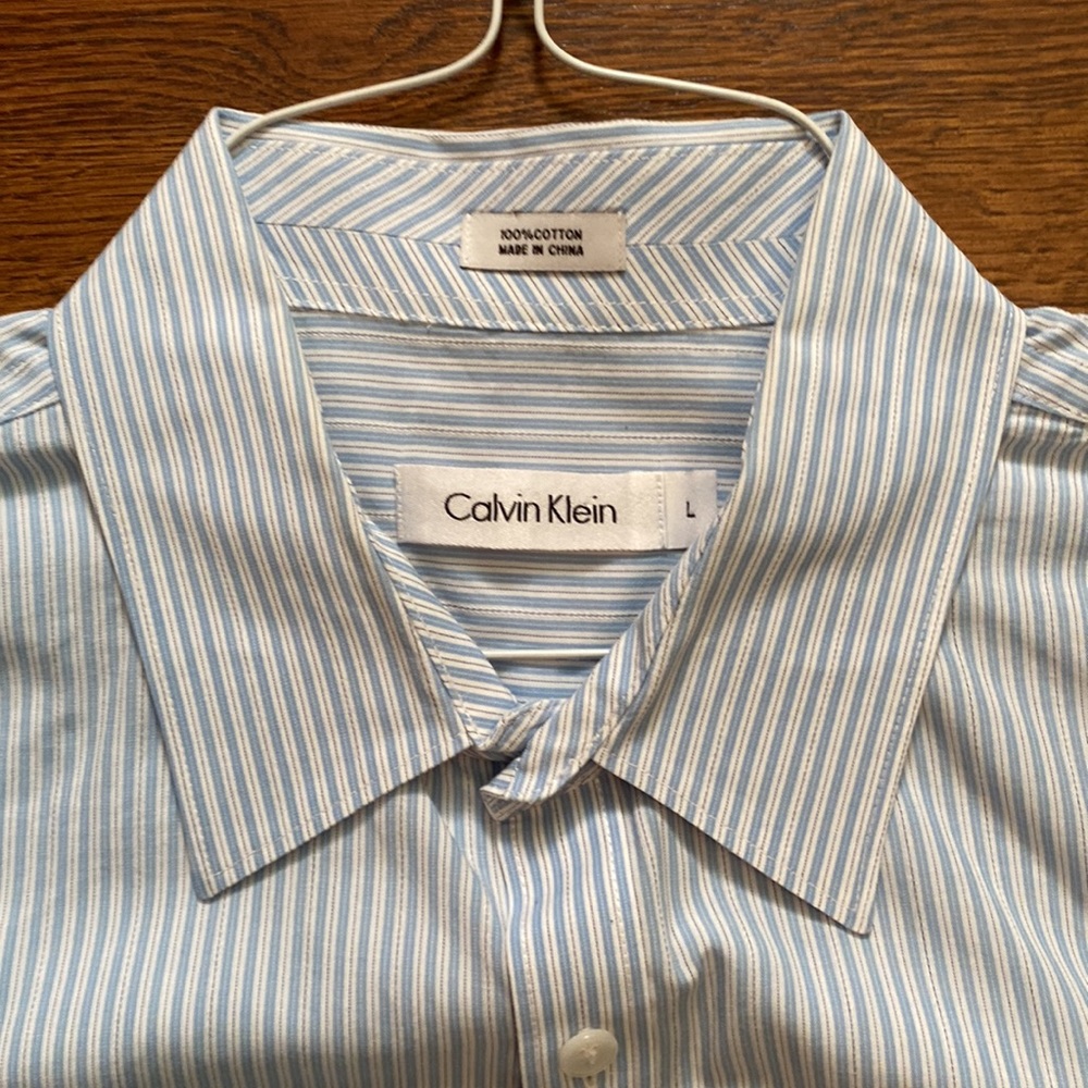 Men’s Calvin Klein button up shirt, size large color blue and white stripes